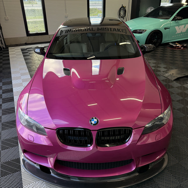 Windshield sticker "Financial Mistake"